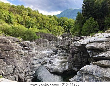 Granite Rock Formations In The Maggia River In The Maggia Valley Or Valle Maggia, Tegna - Canton Of 