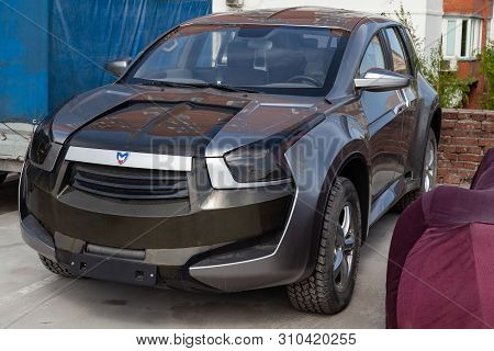 Novosibirsk, Russia - 05.28.2018: Marussia F2 Front View. Photography Of A Russian Supercar Suv On P