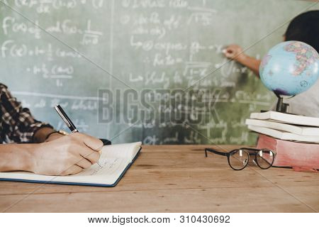 Educational Process. Young People Studying In University Sitting In Auditorium During Lecture Educat