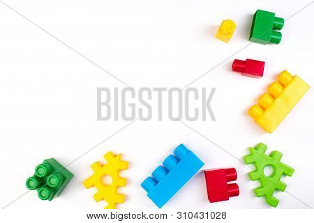 Lot Of Colorful Rainbow Toy Bricks Background. Educational Toy, Constructor For Children Isolated On
