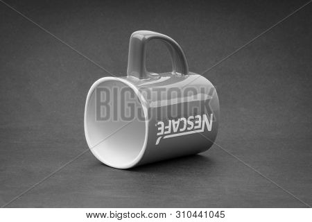 Kuala Lumpur, Malaysia - July 03, 2019; Promotional Red Nescafe Mug On Black And White.  Selective F