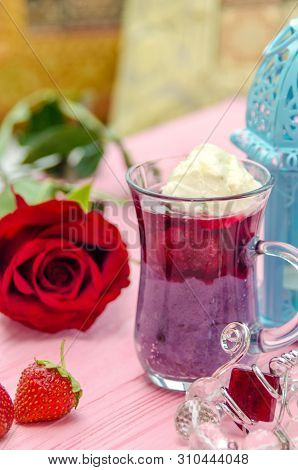 Mahalabia - Traditional Middle Eastern Dessert. Creamy Dessert With Berries And Yogurt Cream. Arabic