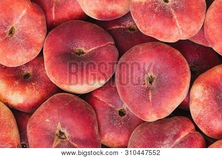 Pan-tao Peach Or Flat Saturn Peach Closeup Background With Full Frame Captured By Peaches. Toned