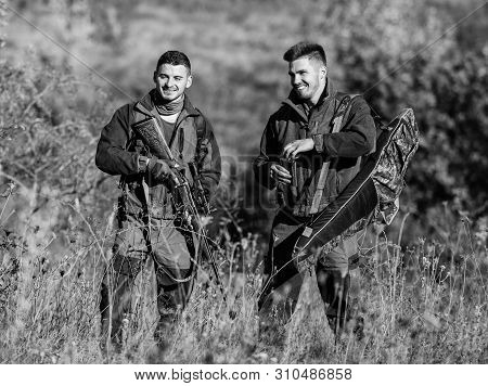 Man Hunters With Rifle Gun. Boot Camp. Hunting Skills And Weapon Equipment. How Turn Hunting Into Ho