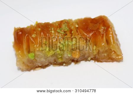 Turkish Style Antep Baklava With Walnut And Pistachio Isolated On White Background.