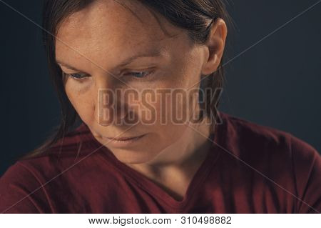 Sensual Melancholic Female Portrait, No Makeup And No Retouching. Adult Caucasian Woman Looking Let 