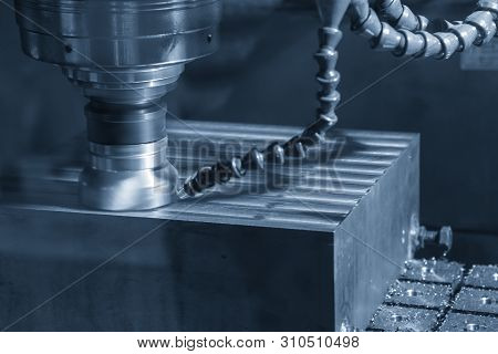 The Cnc Milling Machine With The Face Milling Cutter Cutting The Mould Part. The Rough Cutting The M