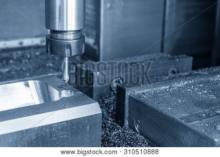 The Cnc Milling Machine Drilling The Centre Drill At The Mould Parts. The Injection Mould Manufactur