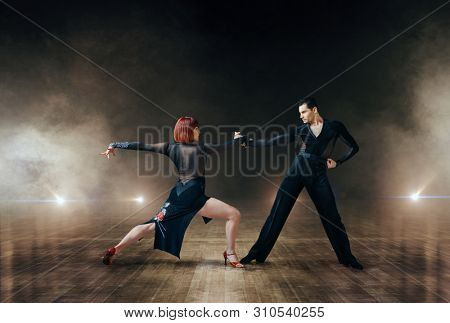 Elegant dancers, latin ballrom dance on stage