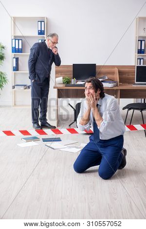 Forensic investigator investigating theft in the office