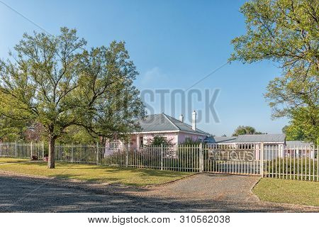 Standerton, South Africa - May 2, 2019: A Street Scene, With An Antique Shop In A House, In Standert
