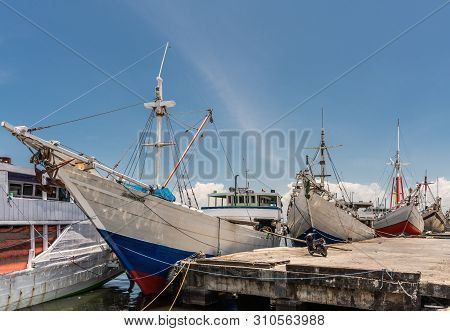 Makassar, Sulawesi, Indonesia - February 28, 2019: Paotere Old Port. Multiple Bows Of Mostly White I