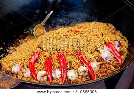 Fragrant Delicious Pilaf With Garlic And Pepper Large. Street Festive Freshly Prepared Food. Delicio