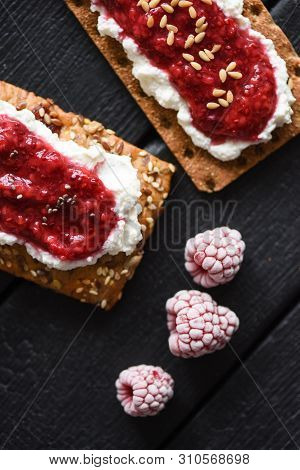Healthy Dessert Flat Lay. Chia Seed Jam With Creamcheese, Flax Seeds And Raspberries On Wholegrain C