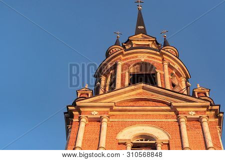 Gothic Orthodox Cathedral. Neo-gothic Orthodox Church With Masonic Symbols. Church Spire Against Blu
