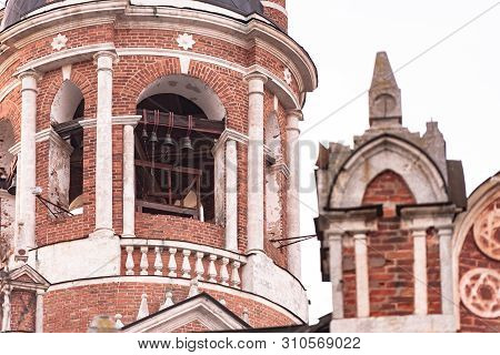 Gothic Orthodox Cathedral. Neo-gothic Orthodox Church With Masonic Symbols. Bell Tower With Bells.