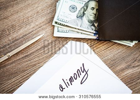 Payments Alimony. White Envelope With Sign Alimony And Money.