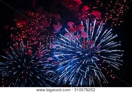 Inexpensive Fireworks, Over The City, White, Red And Blue . For Any Purpose.