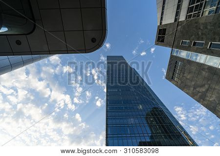 Frankfurt, Germany. July 2019.  Modern Skyscrapers In The Financial District Seen From Below.