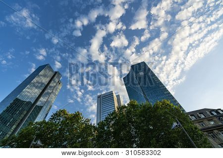 Frankfurt, Germany. July 2019.  Modern Skyscrapers In The Financial District Seen From Below.
