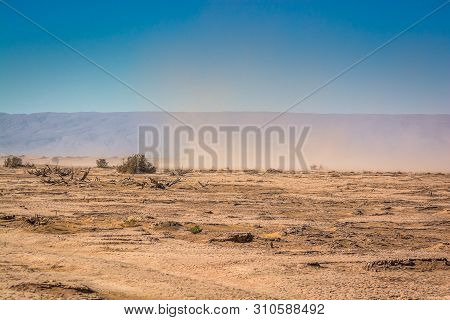 Hamada Desert In Erg Chigaga With Small Sand Storm