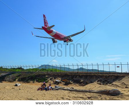 Phuket, Thailand - Apr 4, 2019. Hs-bbm Thai Airasia Airbus A320 Landing Above The Sand Beach Near Ph