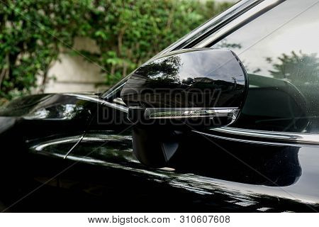 Close Up Wing Left Mirror Of The Black Luxury Car