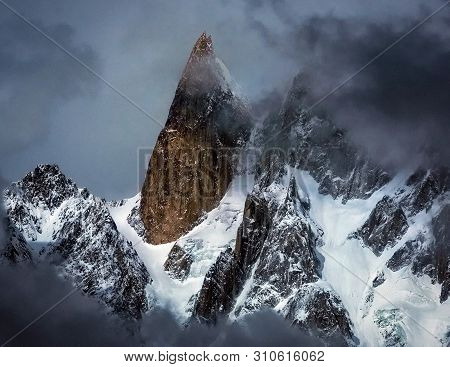 Ladyfinger Peak, (6.000) M High  Is A Distinctive Rock Spire In The Batura Muztagh, The Westernmost 