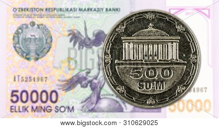 500 Uzbek Som Coin Against 50000 Uzbek Som Banknote