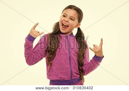 I Am Going Rock This Party. Kid Shouting With Crazy Expression Doing Rock Symbol Hands Up. Music Sta