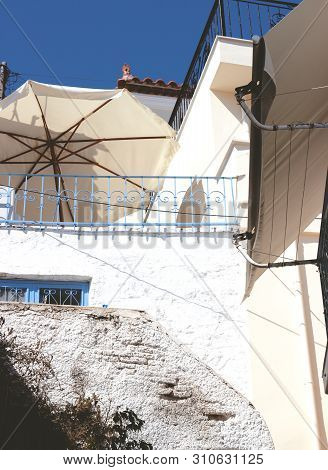 View From The Street; Neorio Town On Poros Island, Greece