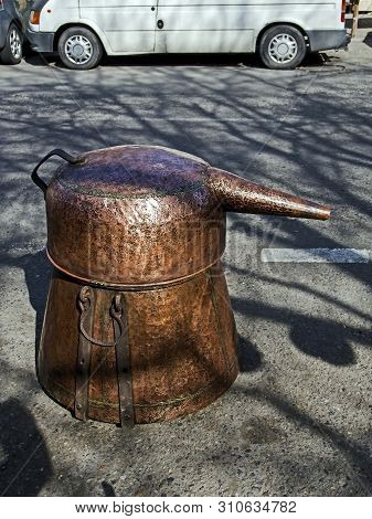 Old Copper Hooch Is Sold At The Flea Market In Georgia In Tbilisi