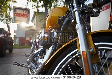 Montreal, Quebec, Canada, September 1, 2018. Harley Davidson Motorcycle Yellow Color At A Gas Statio