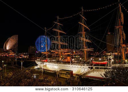 Yokohama, Japan - April 2: Night View Of Yokohama Port With Cosmo World Amusement Park And Nippon Ma