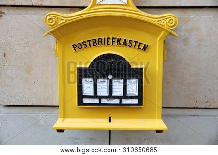 Dresden, Germany - May 10, 2018: Deutsche Post (german Post) Mailbox In Dresden. Deutsche Post Deliv
