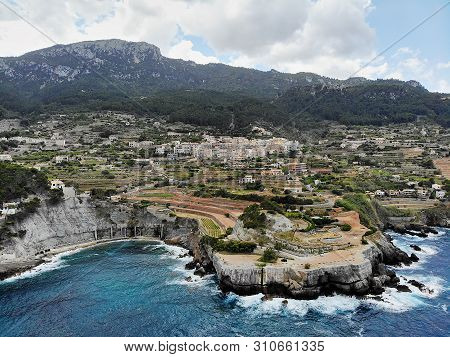Breathtaking Scenery Landscape Waterside Aerial Photo Of Banyalbufar Village Distant View, Rocky Coa