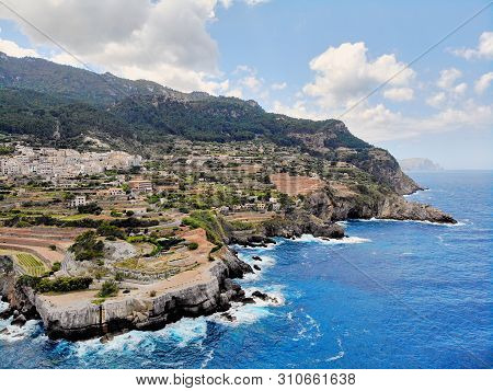 Breathtaking Scenery Landscape Waterside Aerial Photo Of Banyalbufar Village Distant View, Rocky Coa