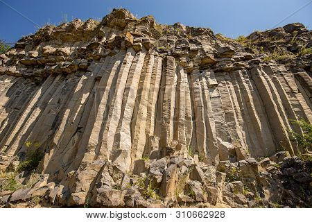 Grey Columnar Basalt, The Columns Form Due To Stress As The Lava Cools
