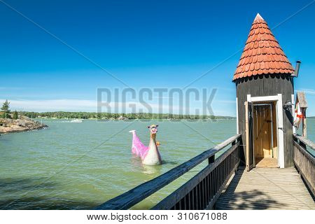 Naantali, Finland - 28 June, 2019: Bathing Hut And Edvard The Booble In Park Moominworld At Sunny Su