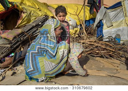 Ajmer, India - February 07, 2019: Indian Family On The Street. Poor People Come With Family To The C