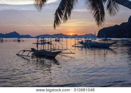 Tropical Landscape With Traditional Boats Of The Philippines. Elnido, The Island Of Palawan.