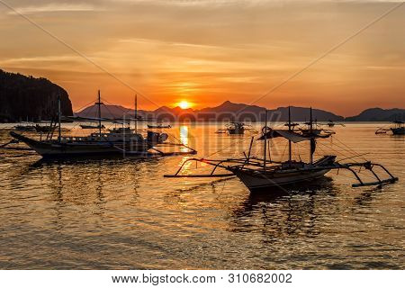 Tropical Landscape With Traditional Boats Of The Philippines. Elnido, The Island Of Palawan.