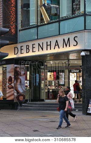 London, Uk - July 6, 2016: People Shop At Debenhams Department Store In London. Oxford Street Has Ap
