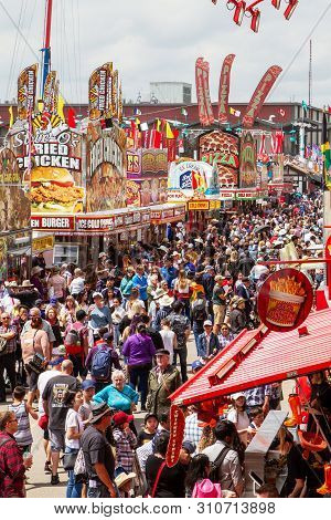 Calgary, Canada - July 9, 2019: A Crowd Filled The Street On Olympic Way Se At The Annual Calgary St