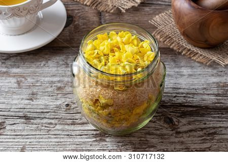 Glass Jar Filled With Fresh Denseflower Mullein Flowers And Cane Sugar, To Prepare Herbal Syrup Agai