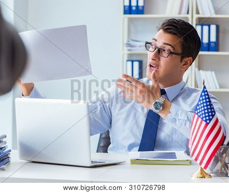 Videoblogger explaining green card visa application process