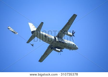 Boboc, Romania - May 22, 2019: Military Paratroopers Jump From An Alenia C-27j Spartan Military Carg