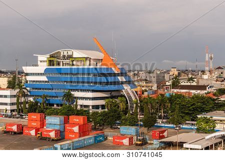 Makassar, Sulawesi, Indonesia - February 28, 2019: Blue, White And Orange Building Named Complex Pt 