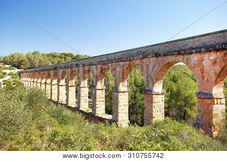 A Part Of The Roman Aqueduct Built To Supply Water To The Ancient City Of Tarraco - Now Tarragona, S