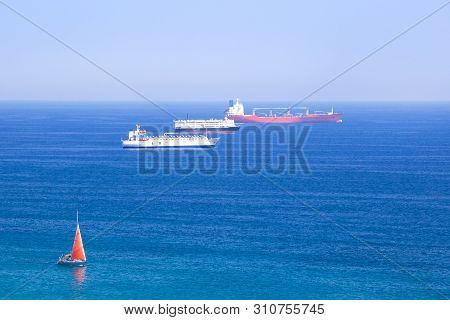 Cargo Ships In The Mediterranean Sea, Spain, Shipping , Logistics , Transportation Systems.